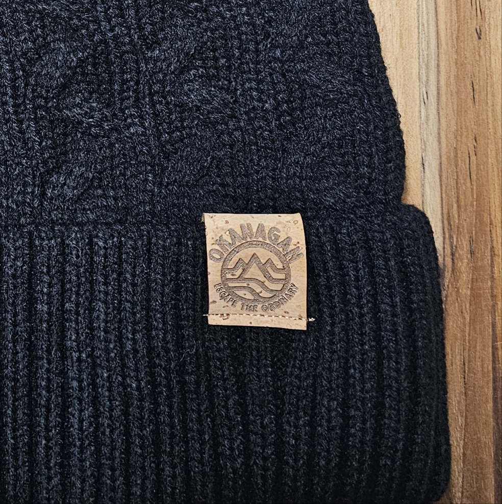 Okanagan Wave Cable Knit Toque with Faux Fur Pom and Cork Patch