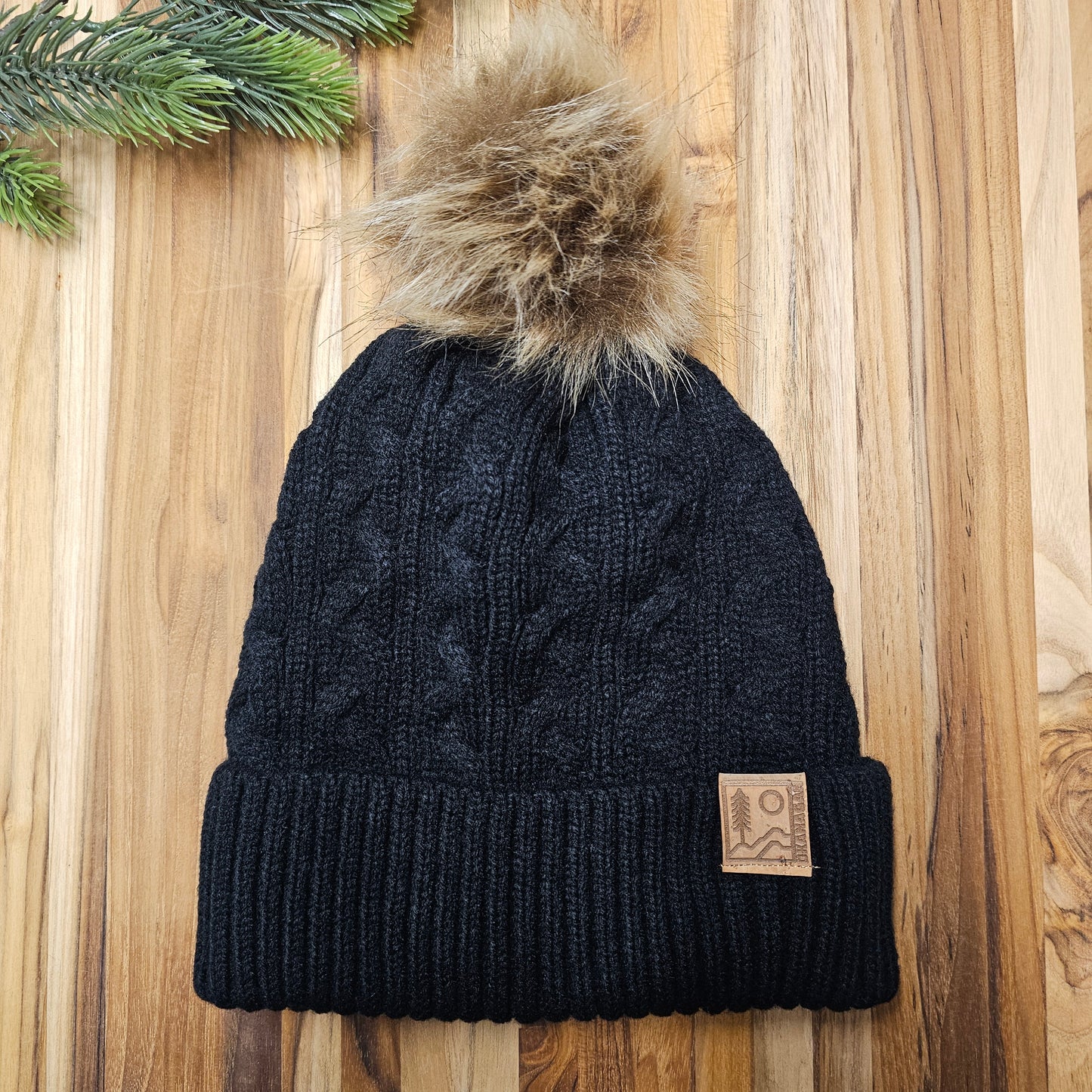 Okanagan Wild Cable Knit Toque with Faux Fur Pom and Cork Patch - Black